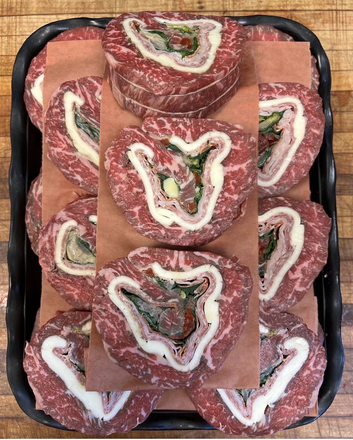 Hand-rolled stuffed beef cuts at Peconic Prime Meats butcher shop in the Hamptons